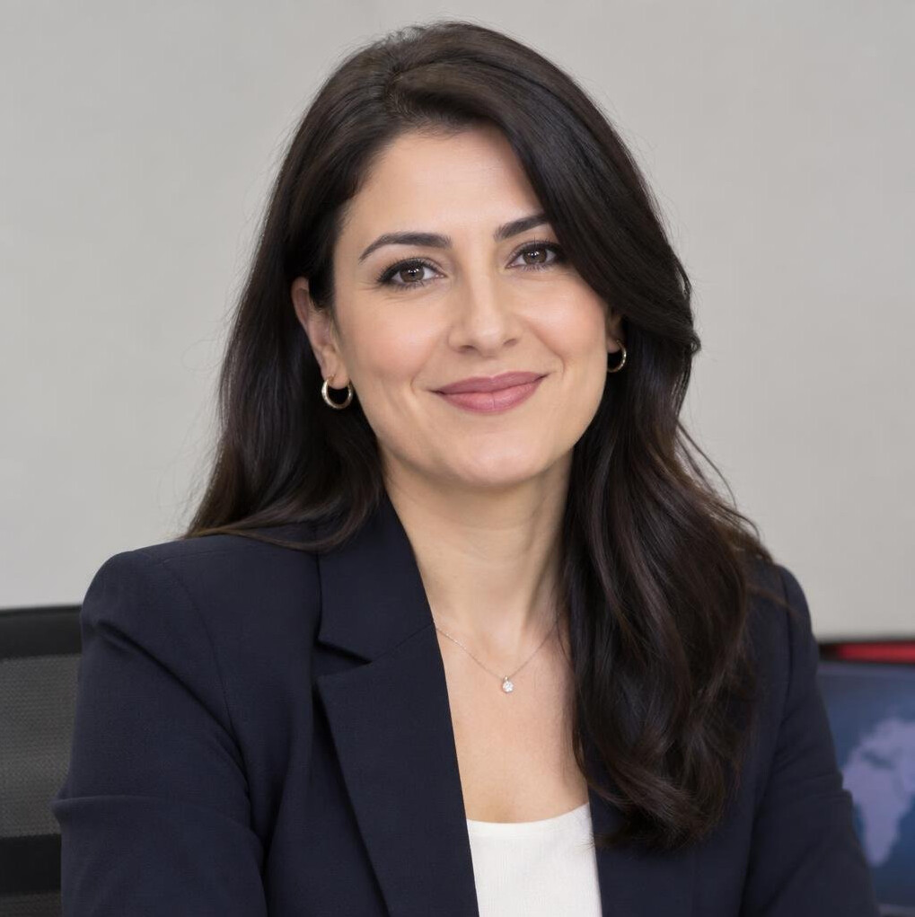 Portrait of a young Turkish woman journalist smiling